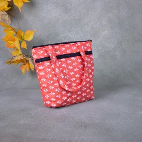 Small Handbag Orange Colour with White Small Prints.