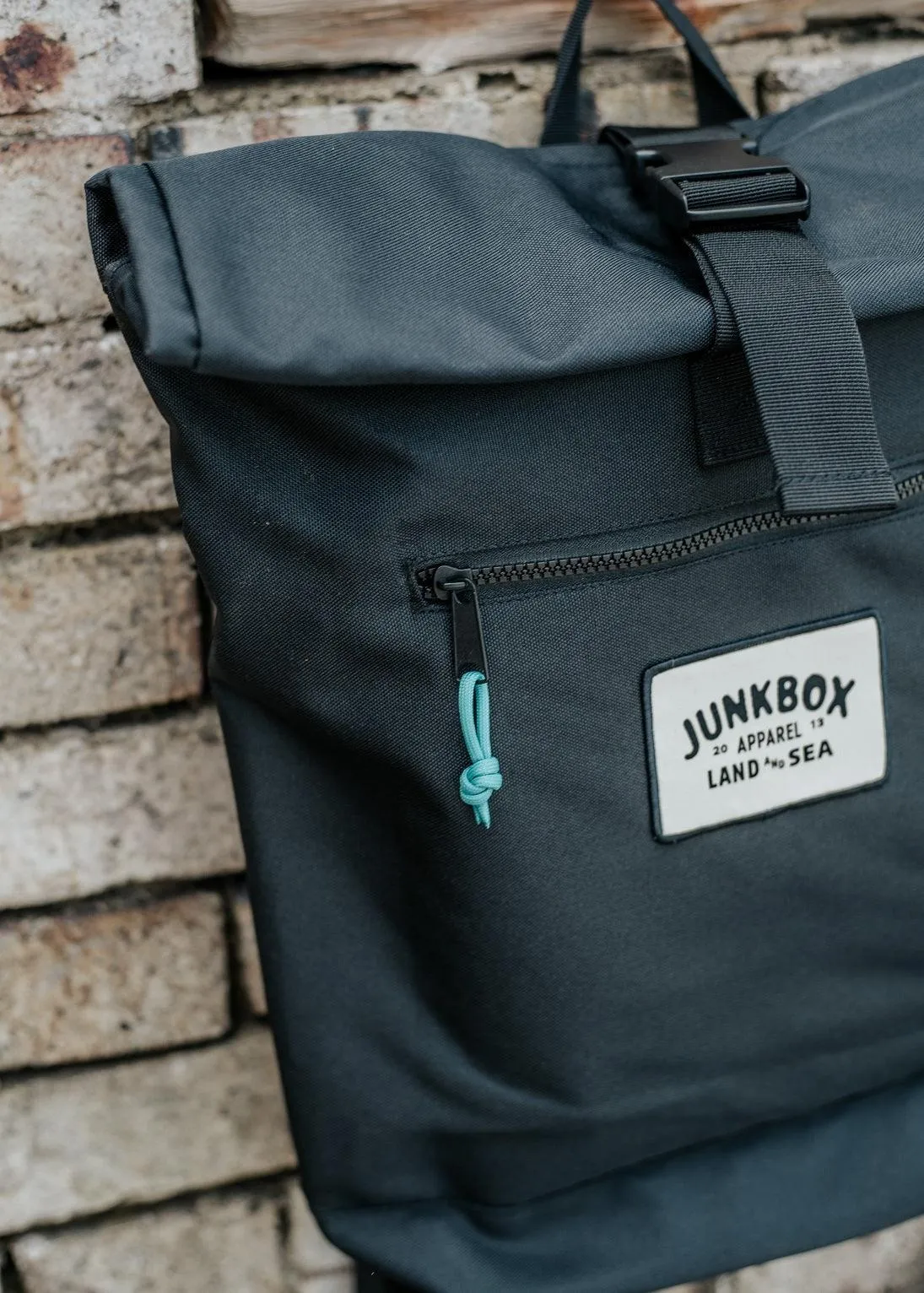 'The Adventurer' Recycled Roll-Top Backpack in Black