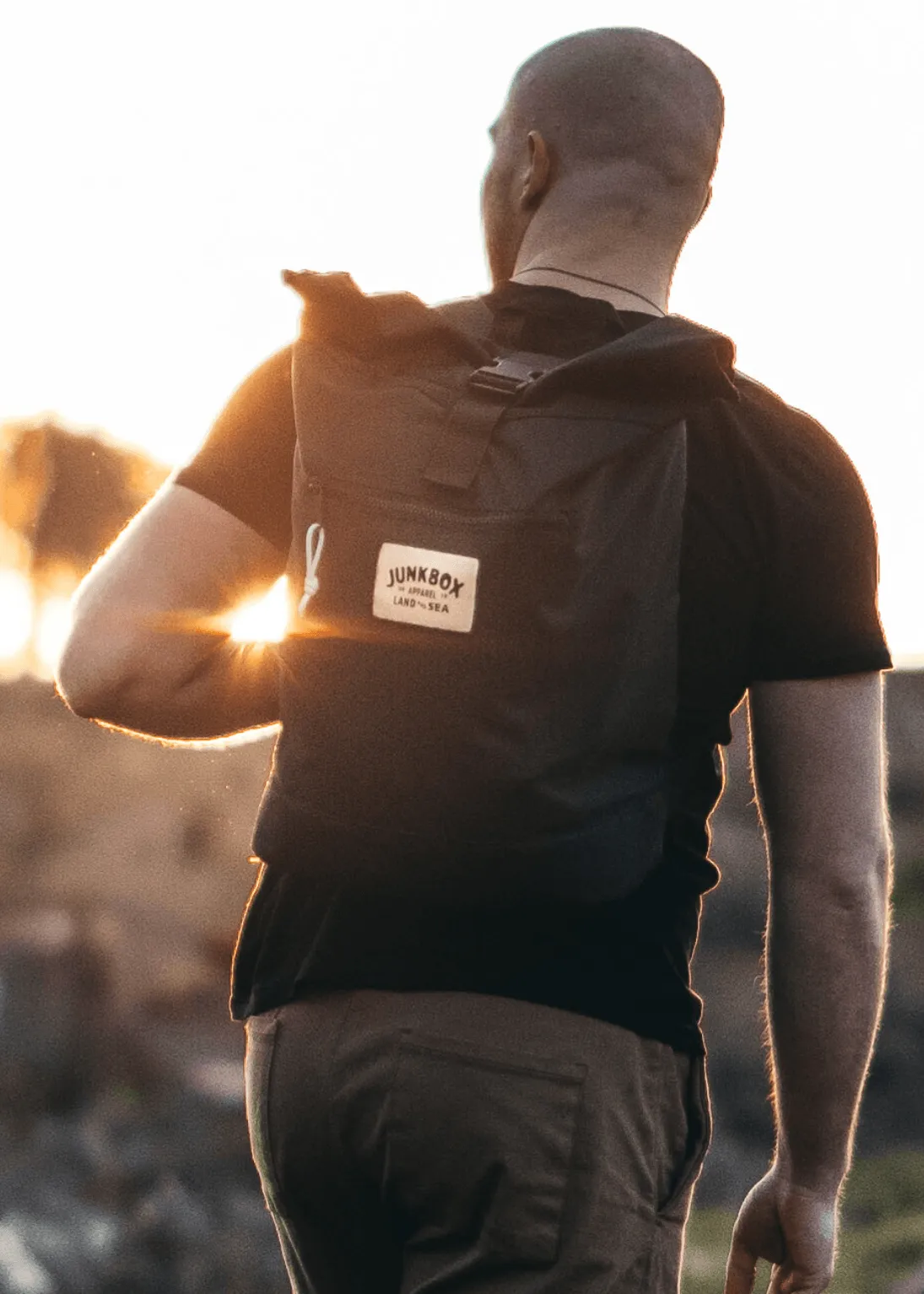 'The Adventurer' Recycled Roll-Top Backpack in Black