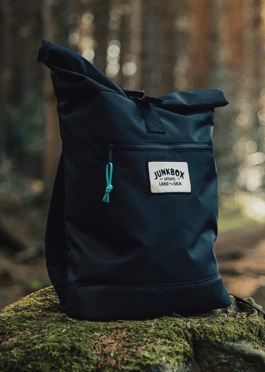 'The Adventurer' Recycled Roll-Top Backpack in Black